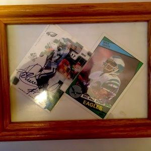 Autographed Mike quick and Harold Carmichael cards